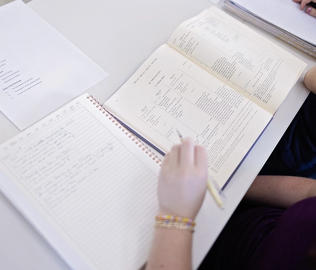 Philosophy Student Taking Notes