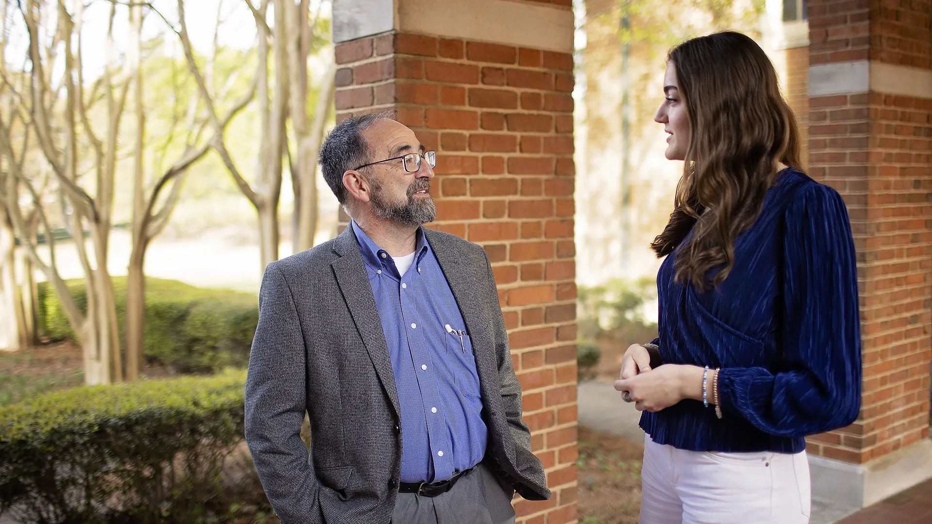 Philosophy Student Talking to Teacher