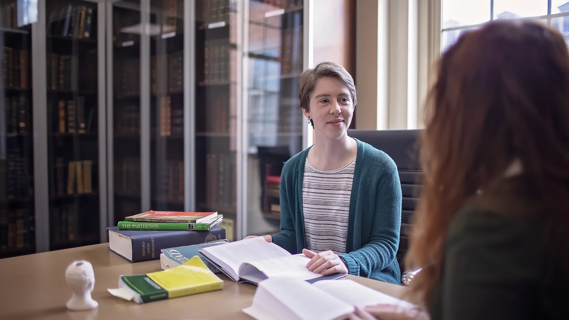 two female students studying DR03162023325