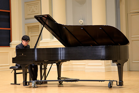 Student Playing Piano