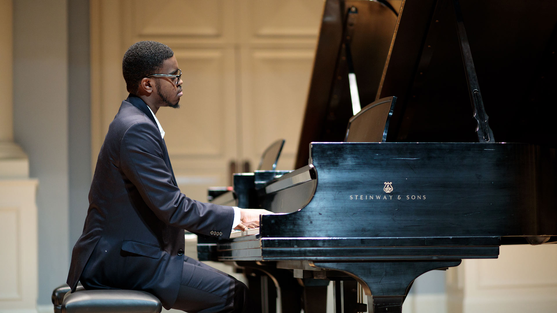 student playing piano