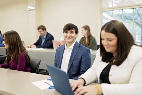 smiling male student in class DR10042023819 th