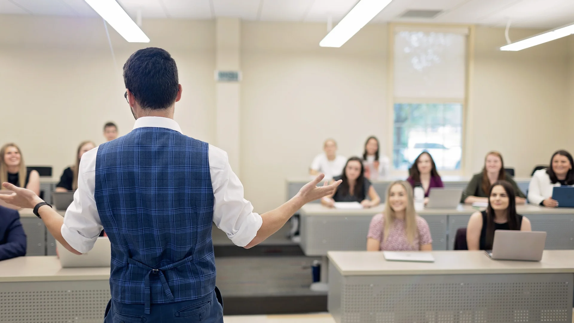 Back of teacher in class DR10042023784