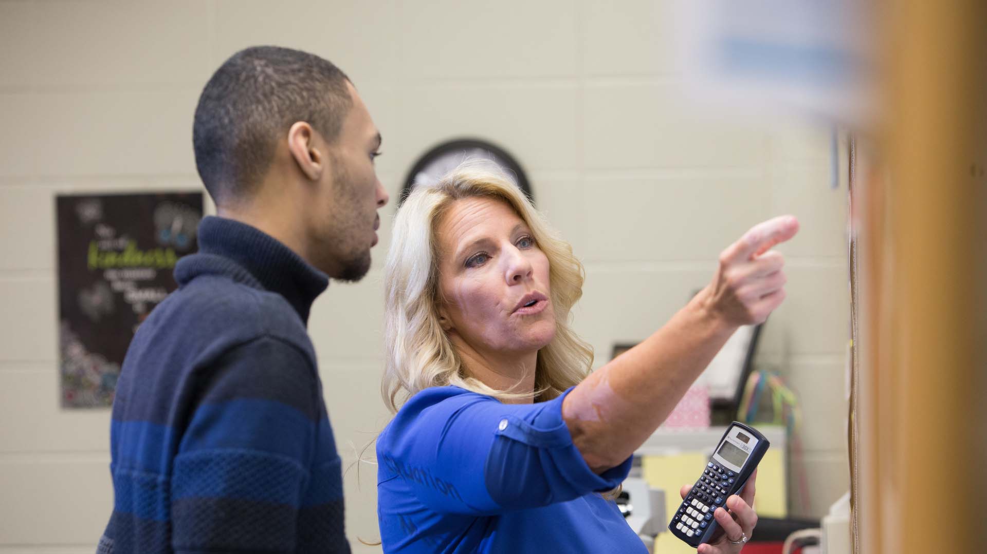 female teacher with calculator