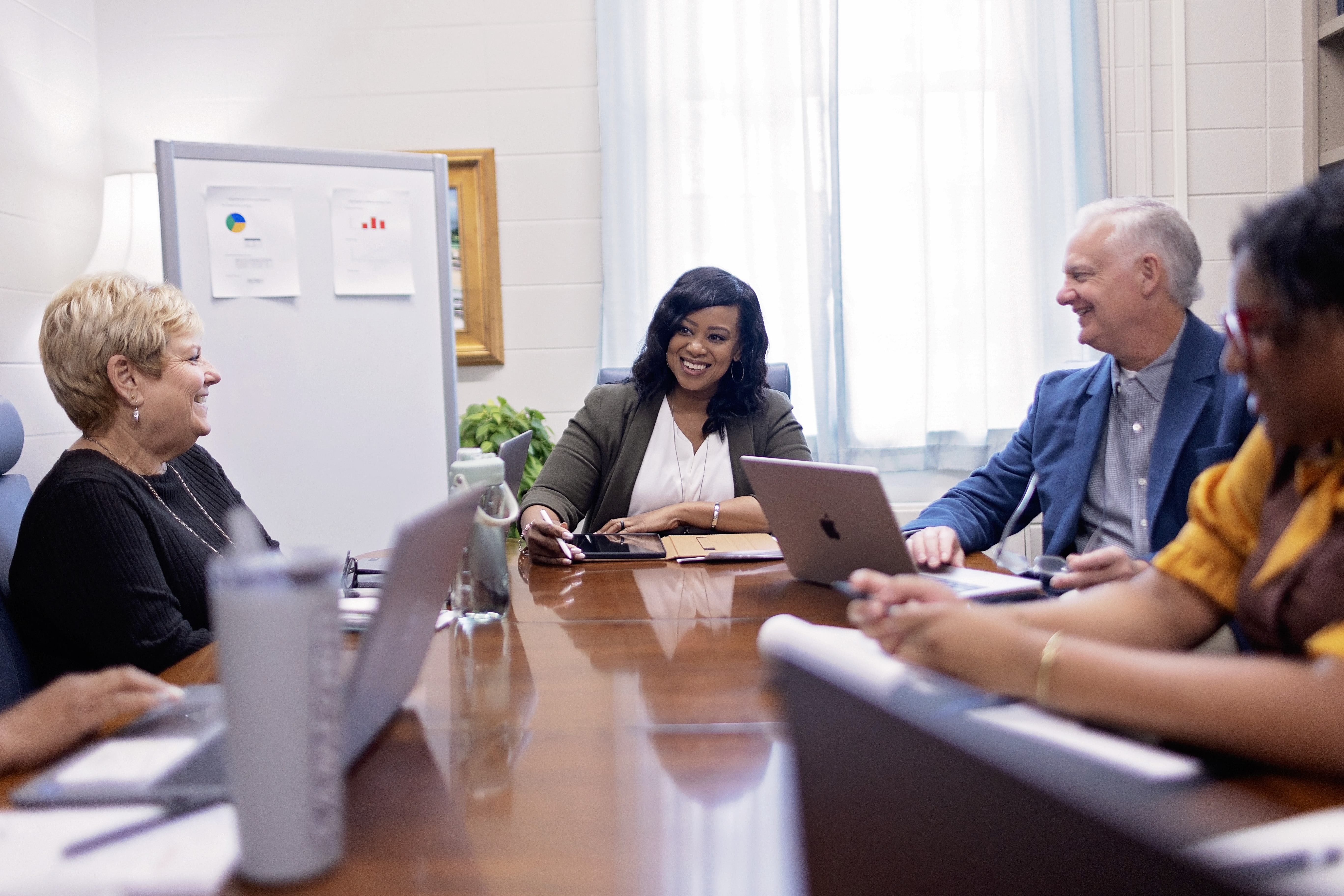 Sie Clay Conducting a Meeting