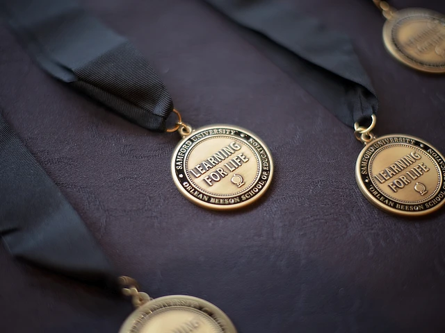 learning for life medals on table cloth