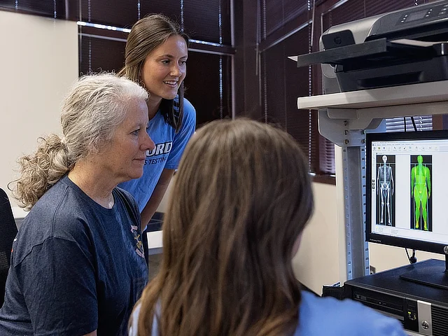 Students going over a scan
