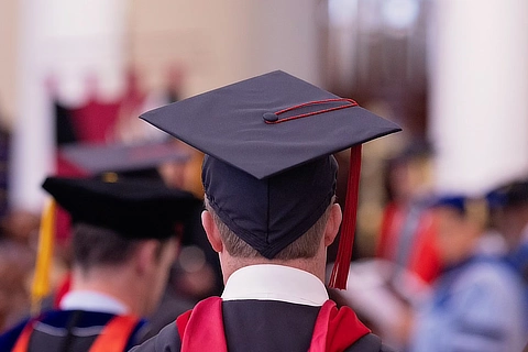 student at graduation with a cap
