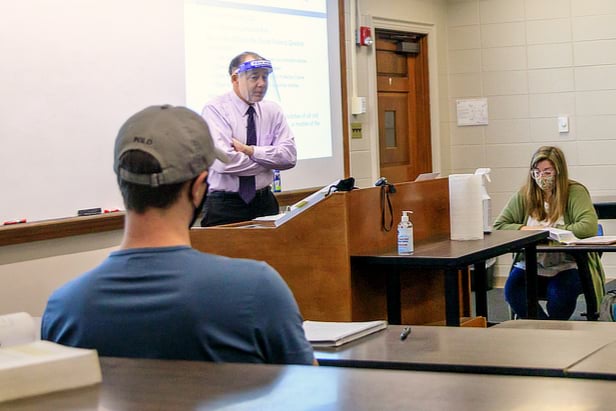 Dean Strickland teaching in a face shield