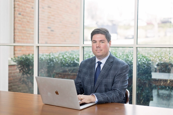 law student working on laptop