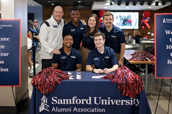 Dr Taylor At The Samford Alumni Association Table