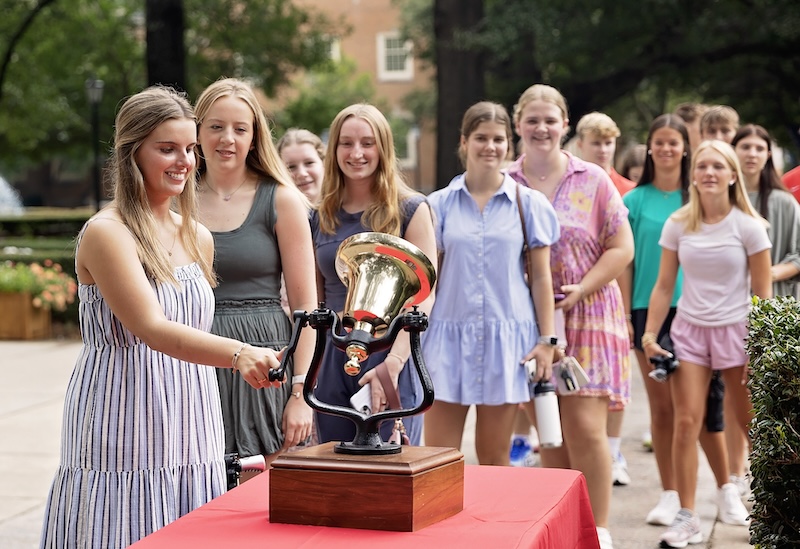 Students-ring-bell-during-freshn-walk-2025.jpg