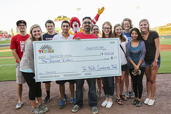 Fiesta scholarship fund check