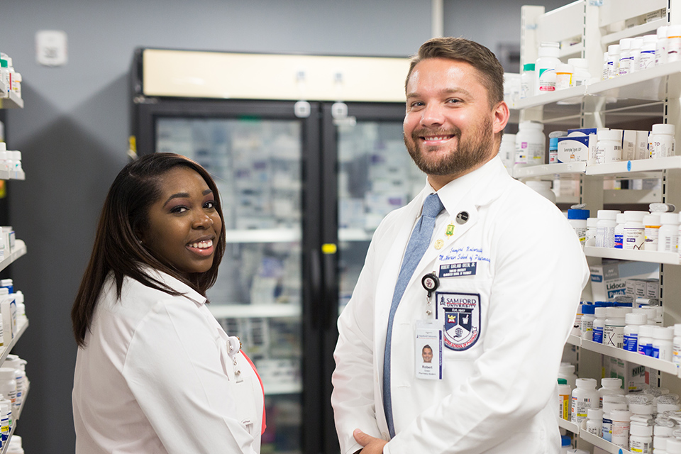 Pharmacy student in Christ Health Center's pharmacy