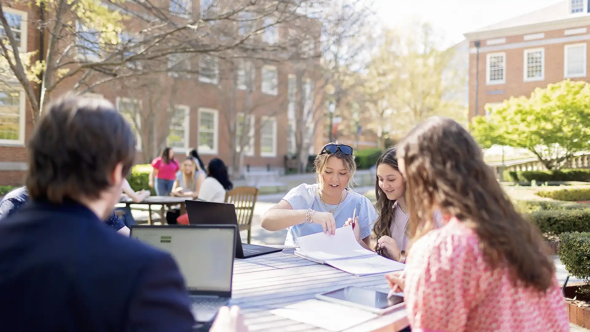 students studying outside DR03292024553