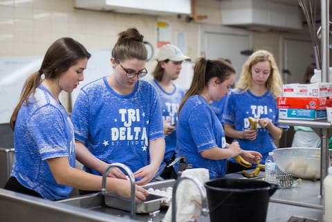 Tri Delta Serving in Kitchen