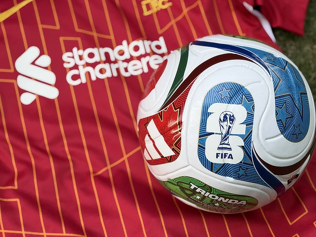 soccer ball ontop of a jersey