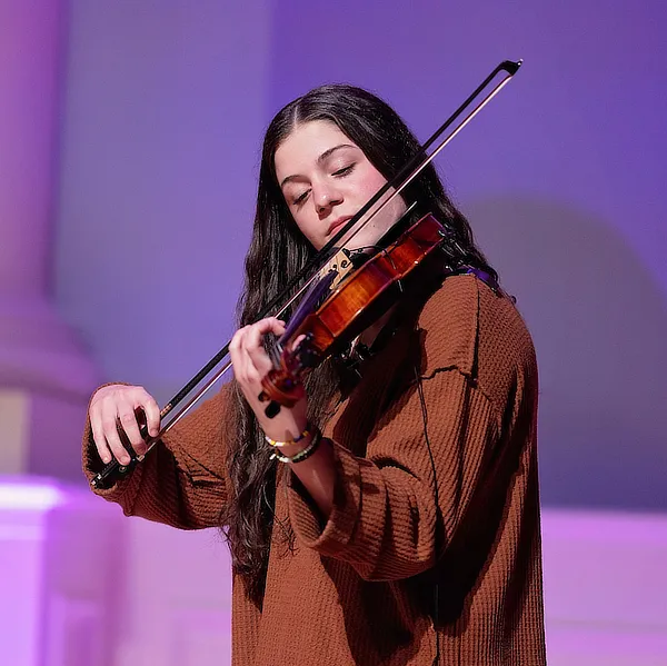 female student playing violin